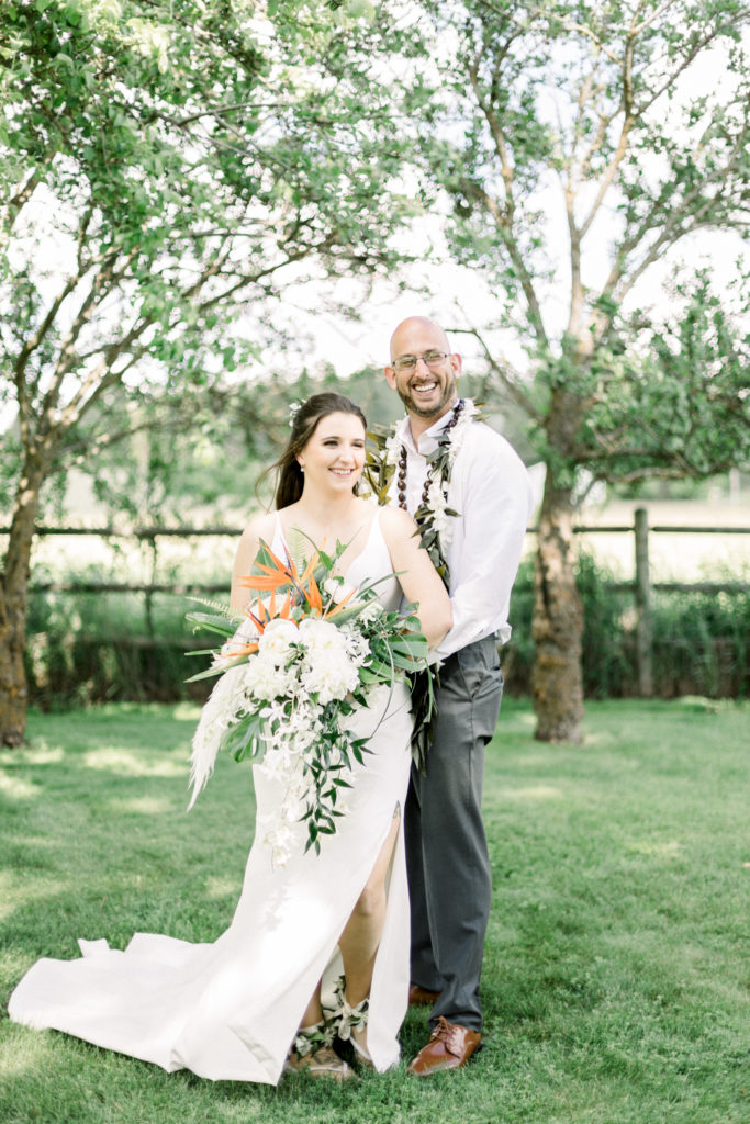 bride and groom smiling on their wedding day taken by Washington elopement photographer 